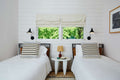 Red room with 2 beds